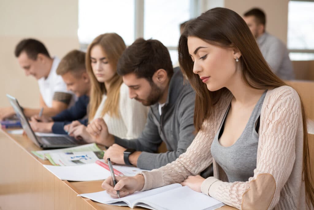 Educational,Process.,Group,Of,Young,People,Studying,In,University,Sitting